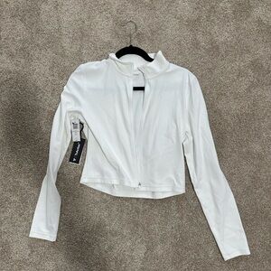 BNWT TNA Butter Limit Zip